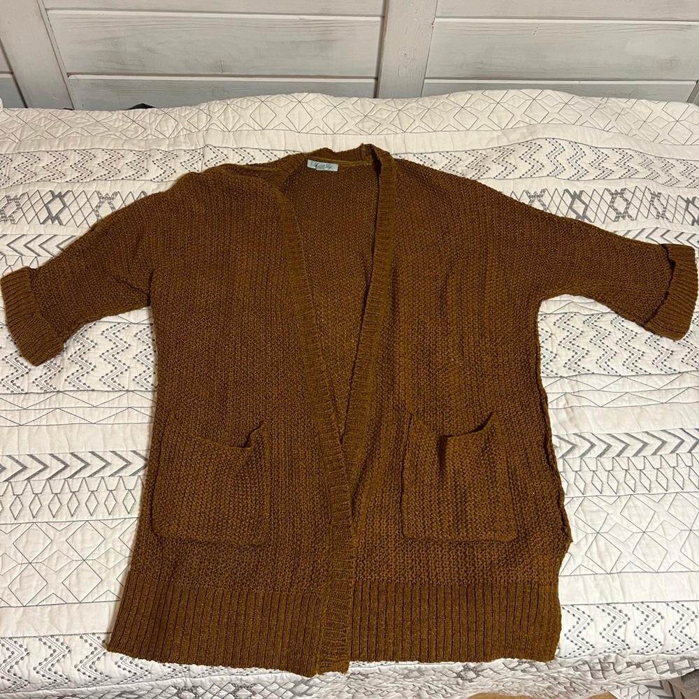 Ladies, half sleeve, knit cardigan with pockets and cuffs